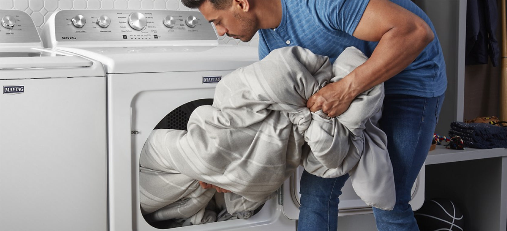 Men washing a duvet cover
